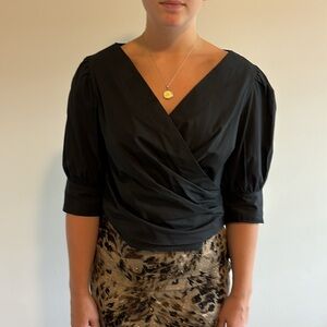 NWOT. Black blouse pouffy sleeves. V-neck. “Anthropologie-esque” APTAP 20"